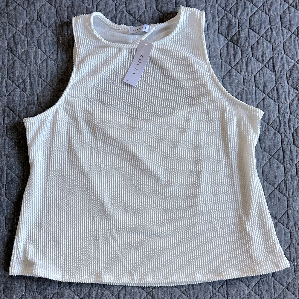 NWT Gilli white tank with cut-out back. Raise ribbed fabric.